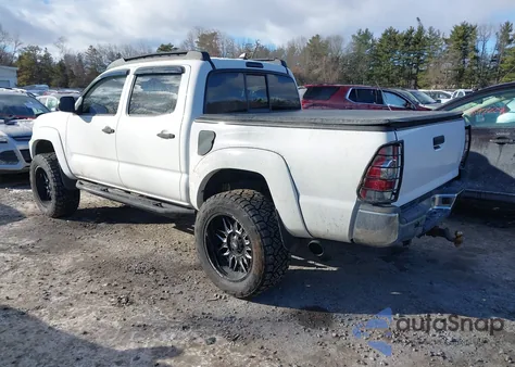 2015 Toyota Tacoma Base V6 z USA, uszkodzony, nr VIN 3TMLU4EN5FM172706